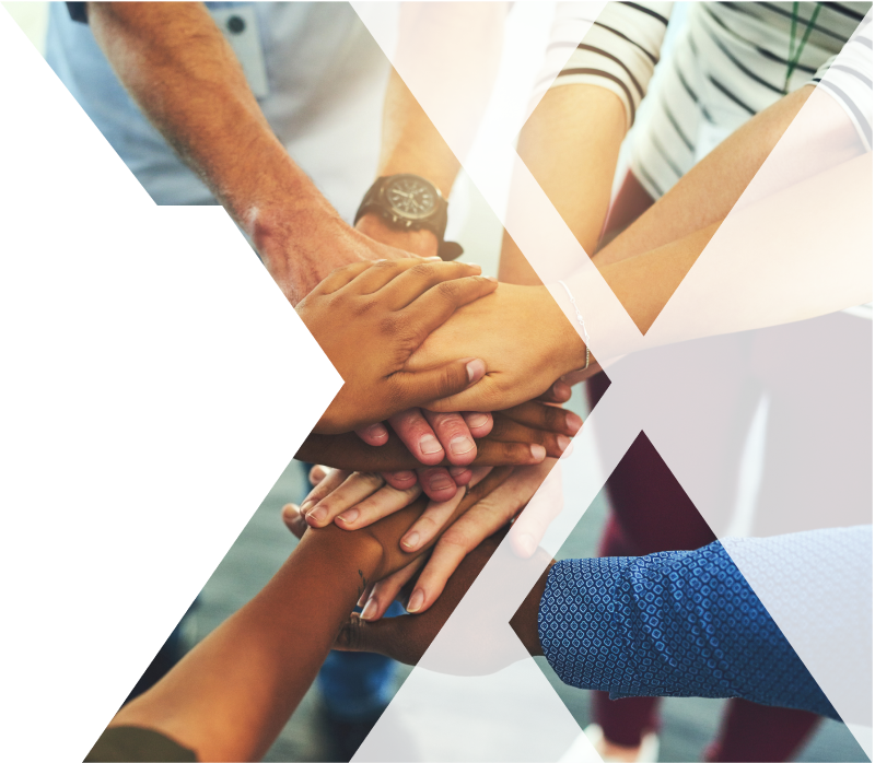 team of hands stacked together with an X overlay