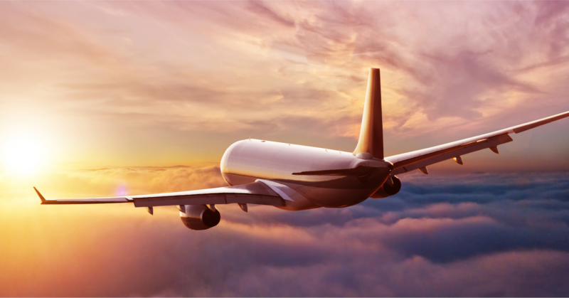 A large airplane soaring through the sky.