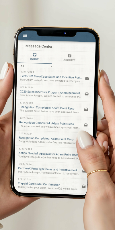 A woman's hand holding an iPhone with an open app.