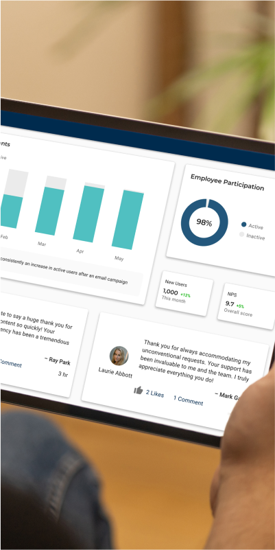 Male holding tablet showing digital dashboard of PerformX.